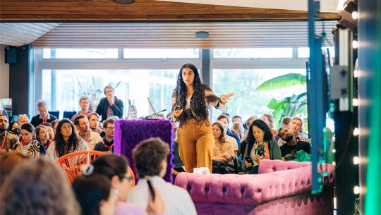 Mona Chalabi on stage at MozFest House Amsterdam