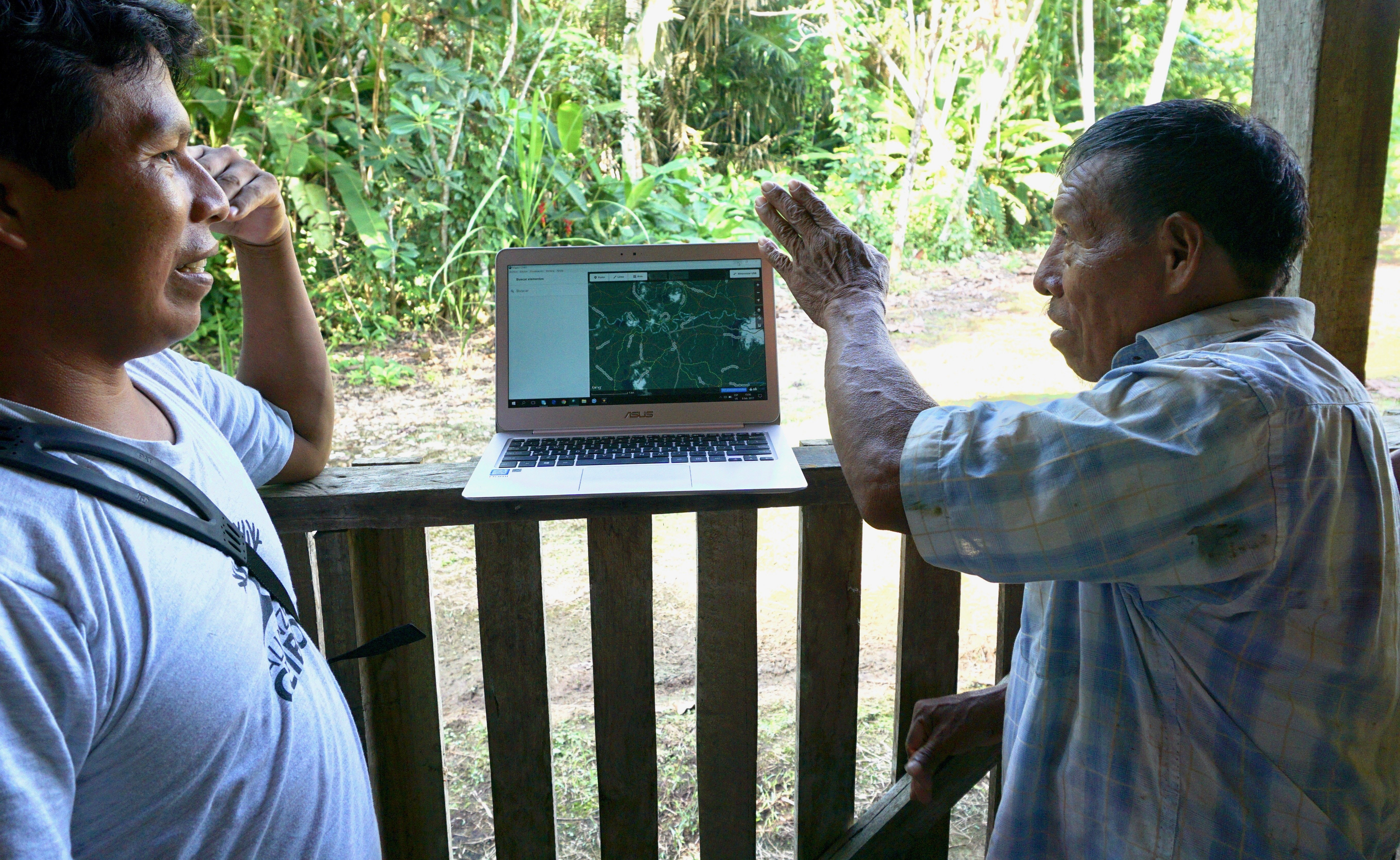 Waorani community members using mapping tool to collect data