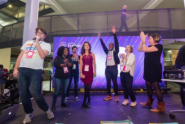 Participants celebrating onstage at MozFest