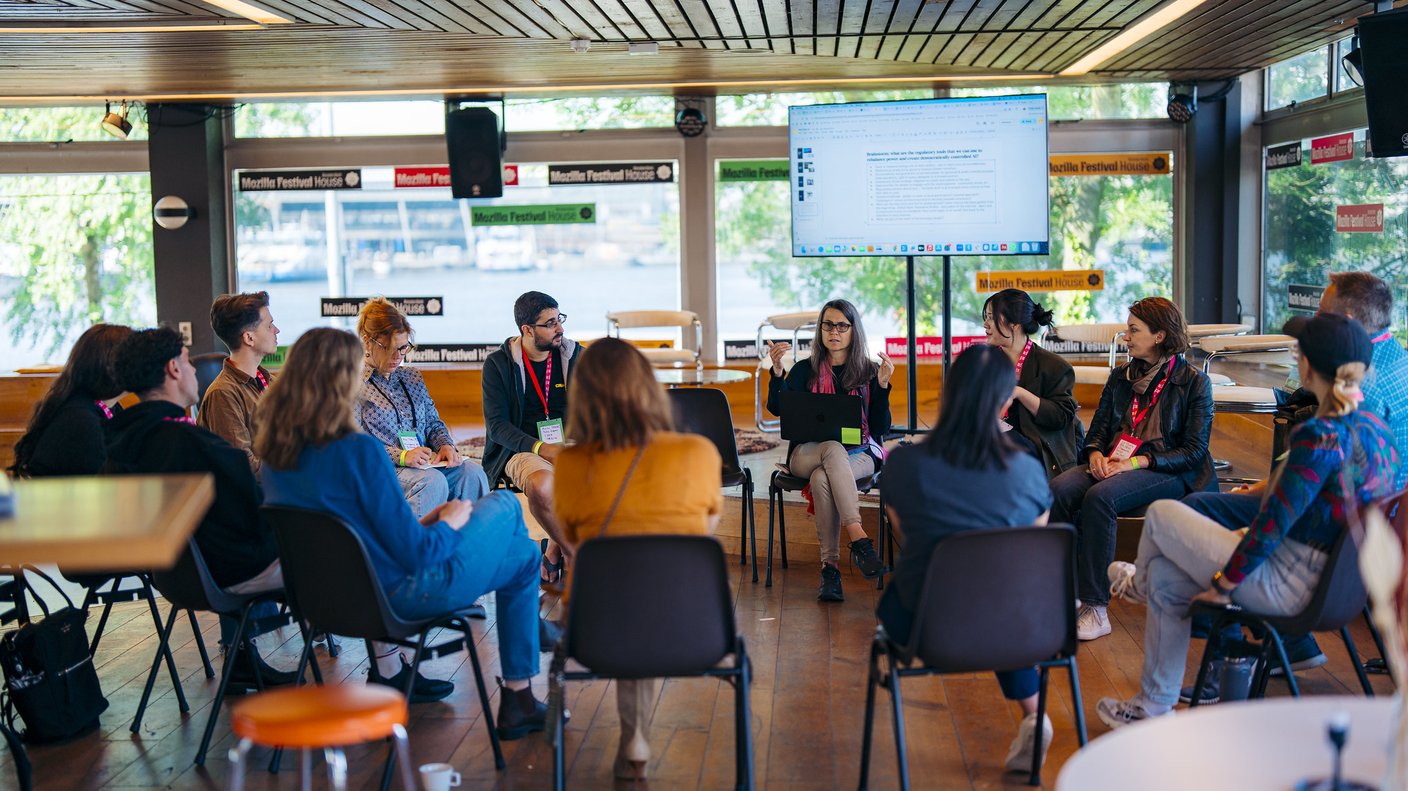 A group of people sitting in a circle