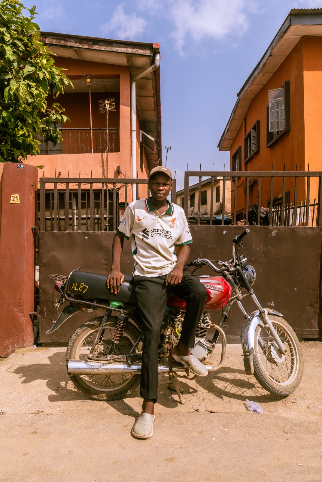 Akbar Aliyu and his motorcycle.