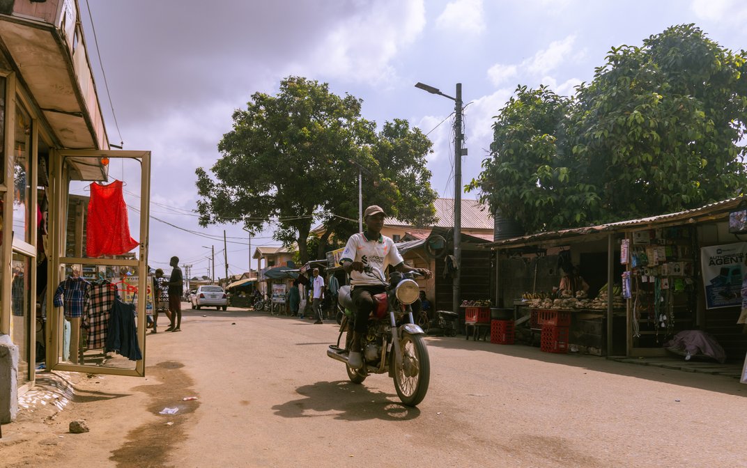 Akbar Aliyu on his motorcycle.