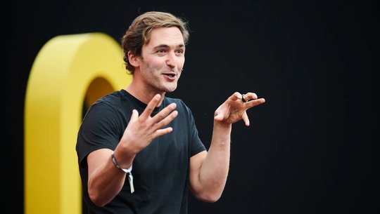 Jason Silva on stage at Mozilla Fesitval
