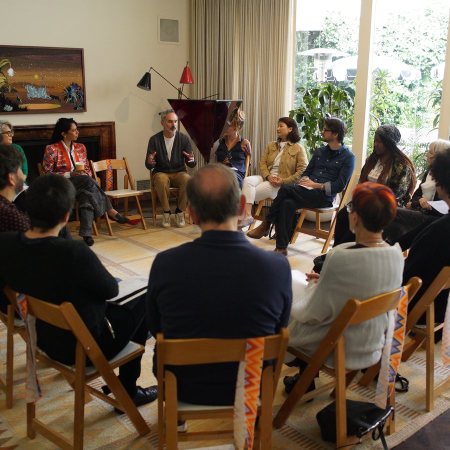 Group of people working together to ideate solutions.