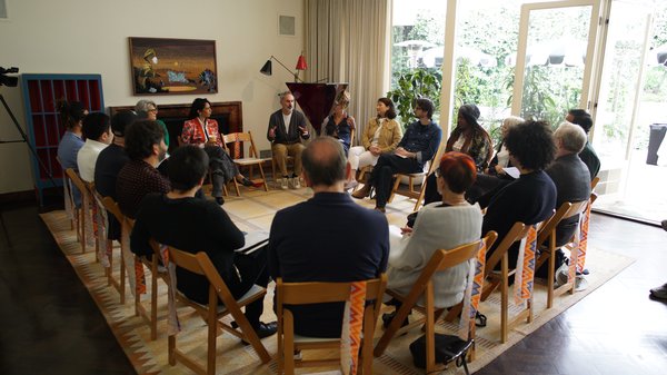 Group of people working together to ideate solutions.