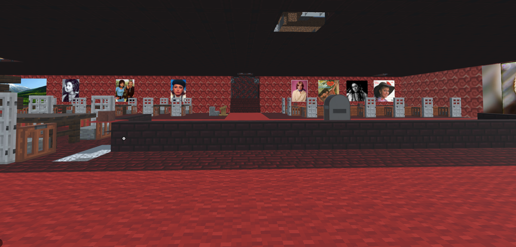 A virtual red world with a large table and portraits along the wall