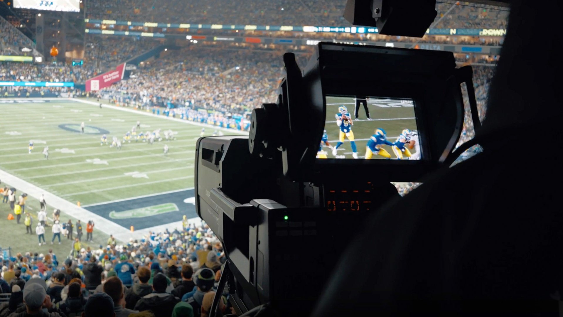 A broadcast camera at an NFL game