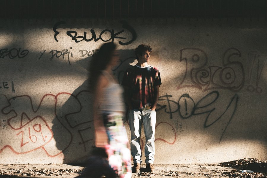 Two models wear designs from Italian anti-surveillance clothing company Cap_able designs.