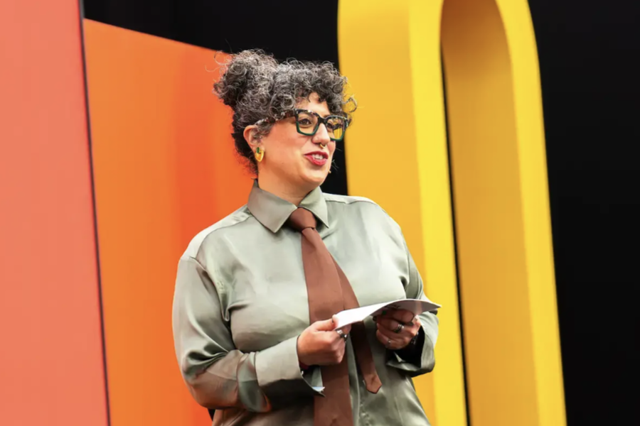 Zeina Abi Assy Mozilla Festival Director - speaking on stage at MozFest - Zoomed in