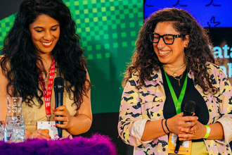 Two women on mozilla festival stage