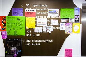 Posters on a wall a MozFest